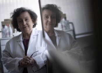Pneumologist's physician Margareth Dalcolmo poses for a photograph at her medical office in Rio de Janeiro, Brazil on March 9, 2021. - Dalcolmo, a 65-year-old pulmonologist, was an unknown researcher at public health institute Fiocruz when Covid-19 arrived in Brazil in February 2020. But the soft-spoken expert has since made hundreds of media appearances on the health crisis, emerging as a comforting, almost motherly source of information in a country where disinformation and science-bashing are spreading as fast as the virus (Photo by Mauro Pimentel / AFP)